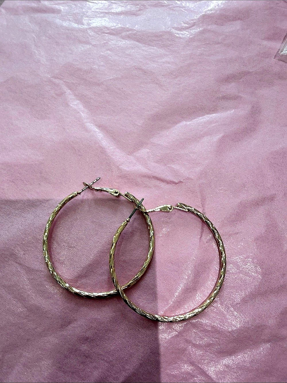 Twisted Hoop Earrings in Gold Like New